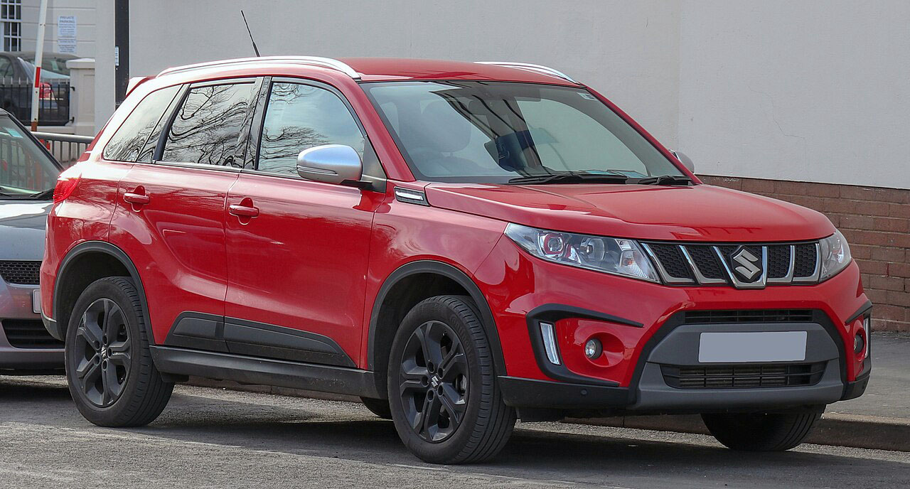 Suzuki Vitara compact SUV, red, front three-quarter view