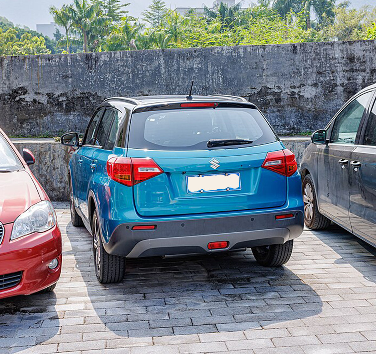 Suzuki Vitara compact SUV, blue, rear view